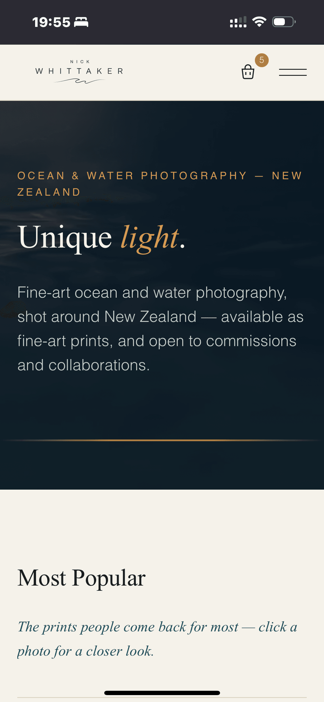 Nick Whittaker Imagery homepage on mobile, showing the 'Unique light.' headline and Most Popular print grid.